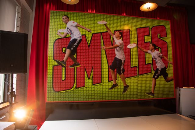 Featured photo from Smyles Ultimate Frisbee Themed Red and Neon Green Celebration at Marshall's Landing Restaurant