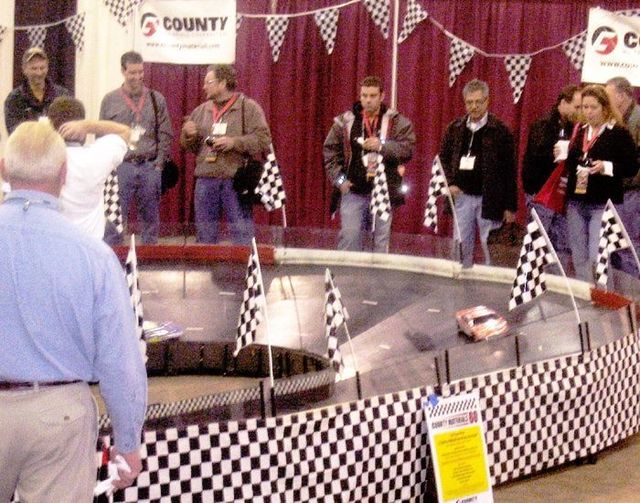 Featured photo from County Materials Company racing at the Hardscape Trade Show