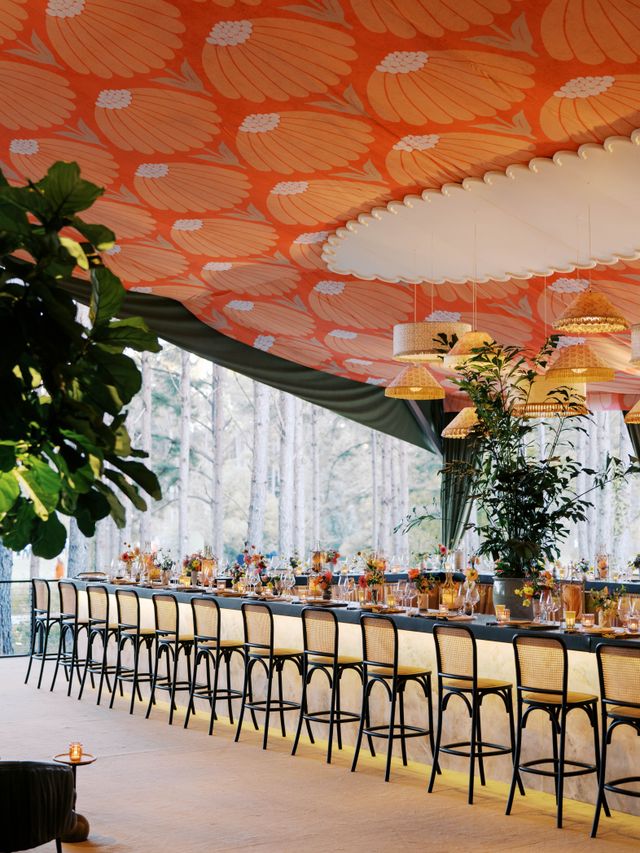 Featured photo from Bold Patterned Tent Wedding at Private Residence