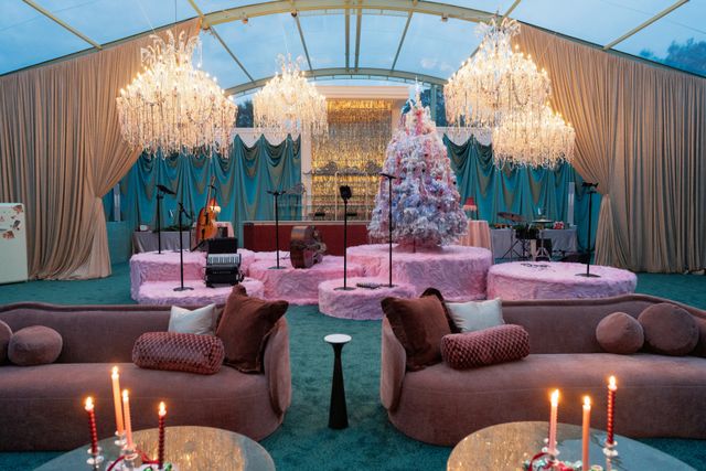 Featured photo from A Glamorous Holiday Party Featuring Chandeliers, Draped Ceilings, and Layered Lounge Seating