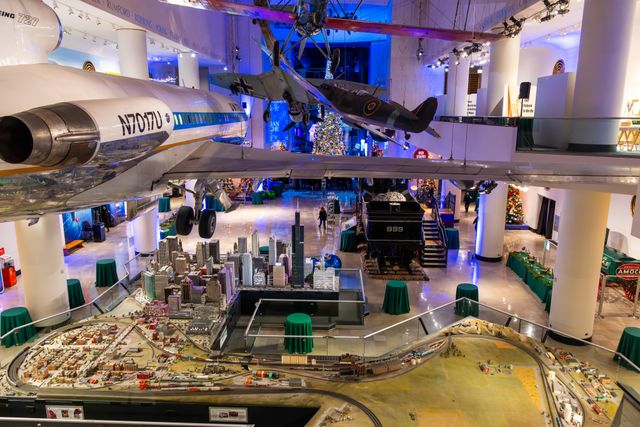 Featured photo from See This Museum-Style Corporate Event Featuring Aviation Displays and Holiday Accents in Chicago