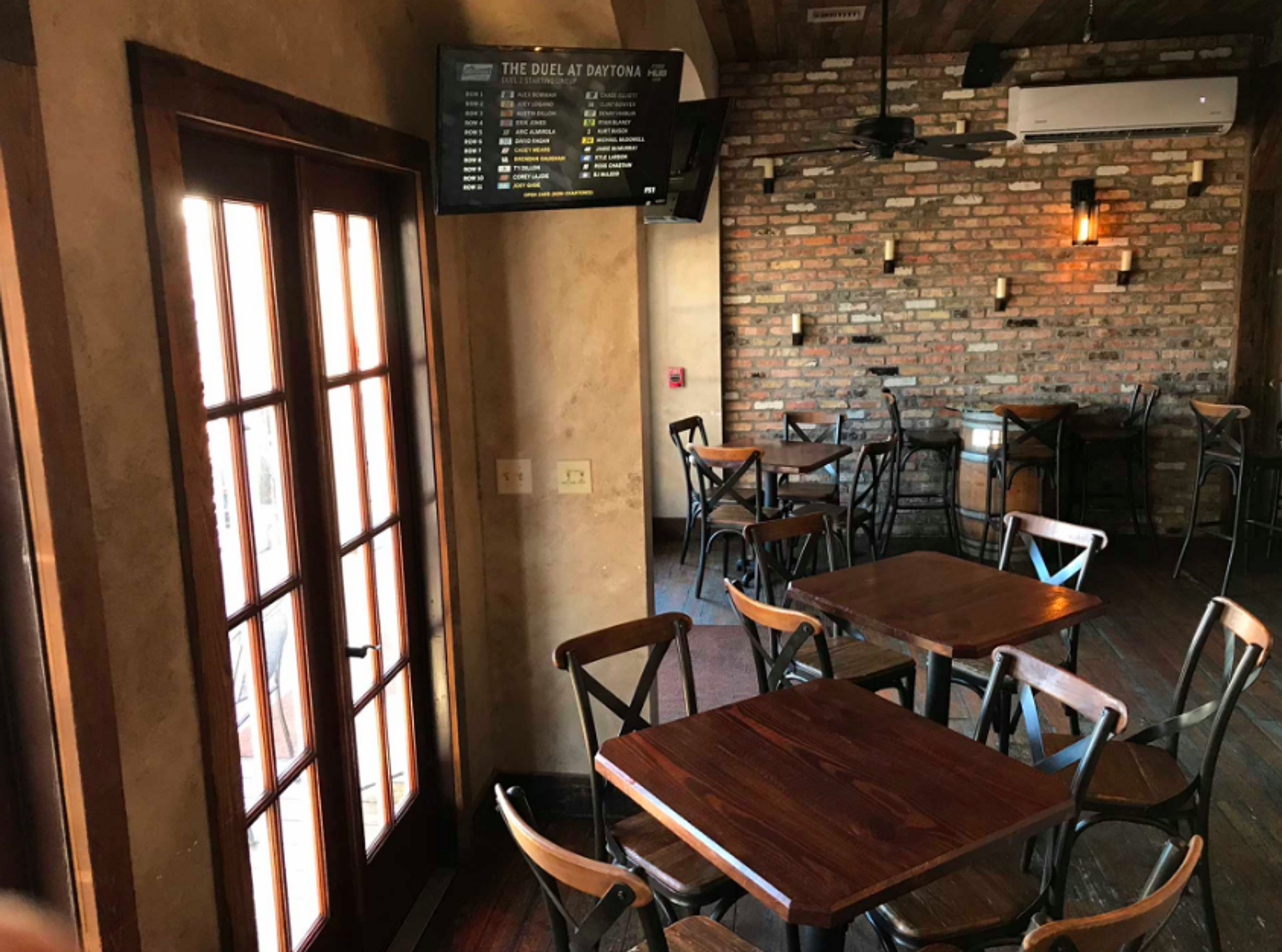 Brickroom and Porch in the Bayou Wine Garden, an event space at Bayou Wine Garden