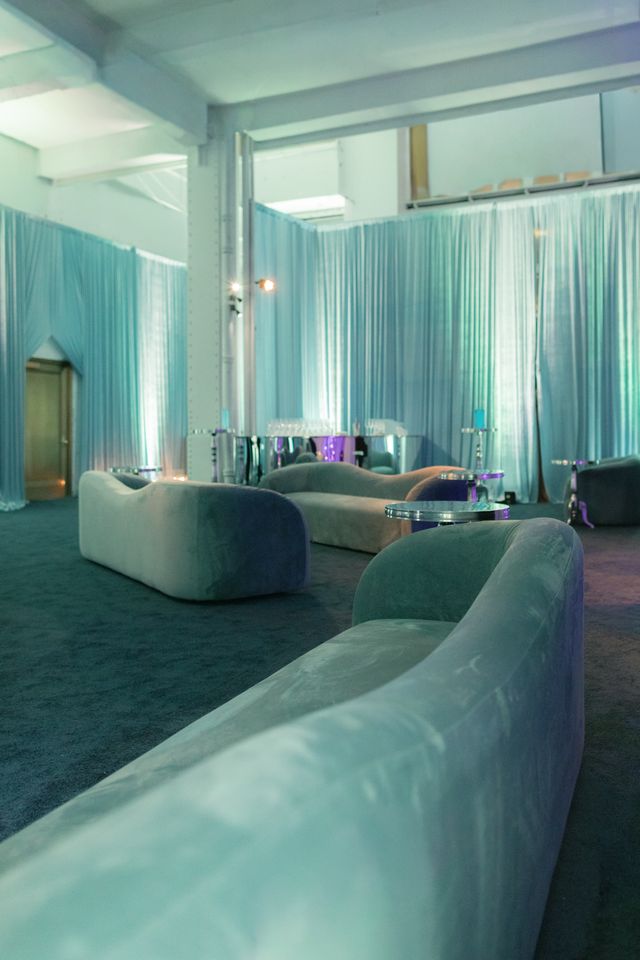 Featured photo from Witness This Elevated Corporate Event Defined by Tonal Blue Draping and Refined Bar Styling in New York