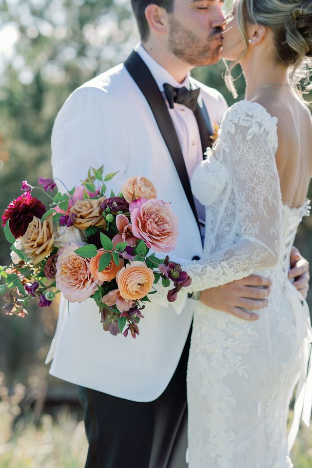 Featured photo from Moody Fall Sanctuary Wedding