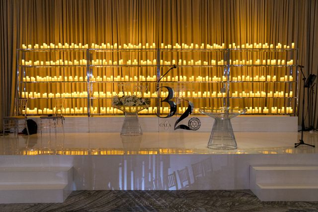 Featured photo from Inside This Modern Gala at Hilton West Palm Beach Featuring Towering Glass Candles and Warm Amber Details