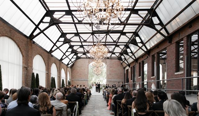 Featured photo from A Chic Chicago Wedding Featuring Crisp White Blooms and Soft Draped Chandeliers