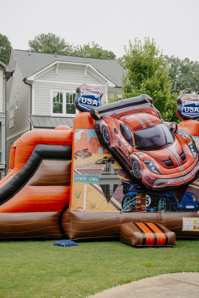 Featured photo from Experience This Race Car-Themed Birthday with Checkered Details and Interactive Tracks in Atlanta, GA