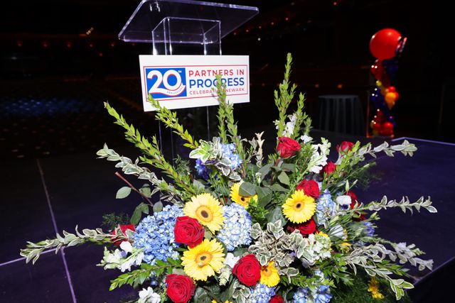 Featured photo from See This Immersive Gala with Graphic Signage and Layered Uplighting at New Jersey Performing Arts Center