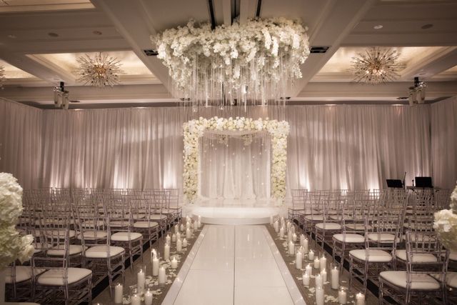 Featured photo from Celebrate This Formal Boston Wedding with Floor-to-Ceiling Draping and Crystal Lighting