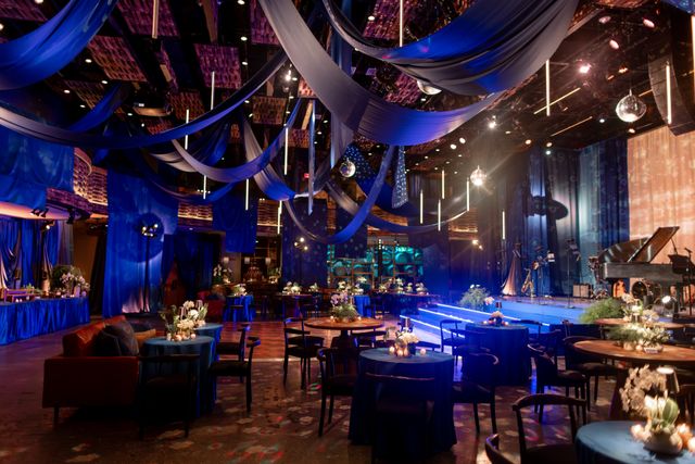 Featured photo from Celebrate This Opulent Birthday Celebration at City Winery NYC with Statement Draping and Jewel-Toned Lighting