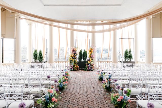 Featured photo from A Modern Waterworks Wedding Featuring a Lush Ceremony Installation and Bright, Textural Tablescapes