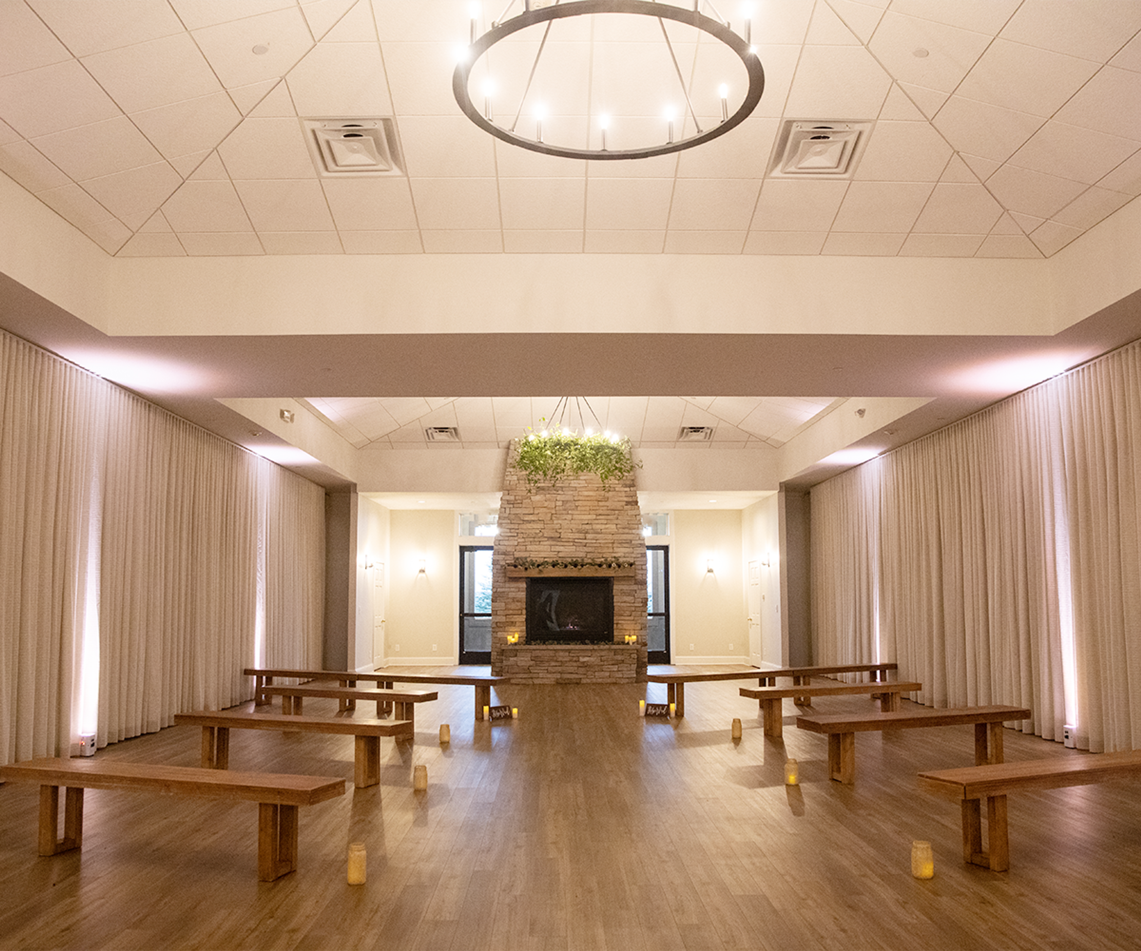 Indoor Ceremony / Fireplace Room, an event space at Ken Caryl Vista by Wedgewood Weddings