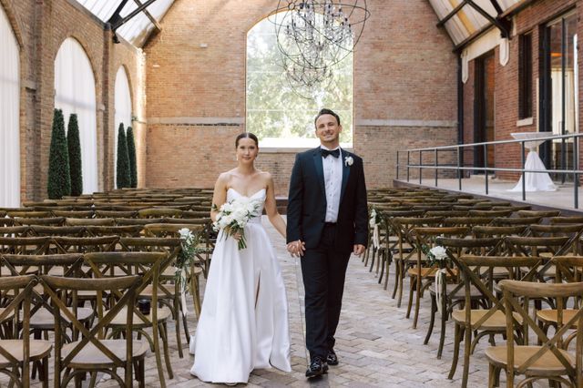 Featured photo from Experience This Chicago Wedding with Romantic Candlelight and Exposed Wood Beam Details