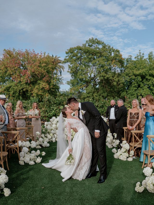 Featured photo from See This Rustic Vineyard Wedding Filled with White Roses, Weathered Wood, and Countryside Charm