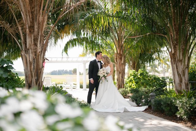 Featured photo from A Classic Wedding at Quail Ridge Country Club Featuring Romantic Florals and Golden Interiors