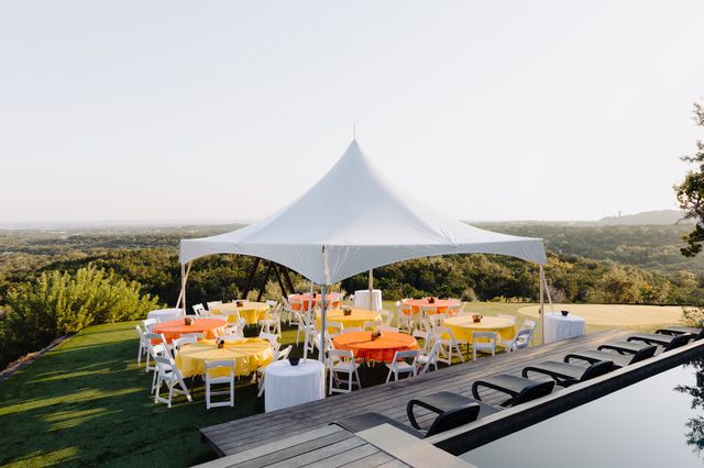 Featured photo from A Scenic Austin Wedding with a Statement Ceremony Backdrop and Marigold-Lined Aisle