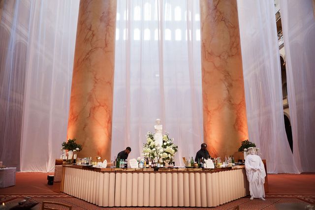 Featured photo from A Sophisticated Wedding Featuring Luxe Tablescapes and Passed Bites at the National Building Museum