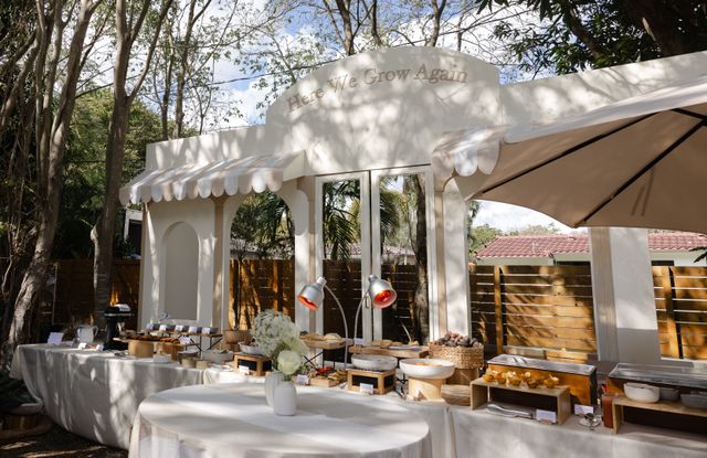 Featured photo from This Al Fresco Baby Shower in Miami, FL Was Meant To Be with Market-Style Grazing Tables and Soft Greenery