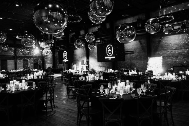 Featured photo from Celebrate This New Year’s Eve Wedding at Armature Works with Disco Ball Details and Midnight Glamour