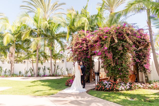 Featured photo from A Southern California Wedding Featuring Blooming Arches and Resort-Style Beauty