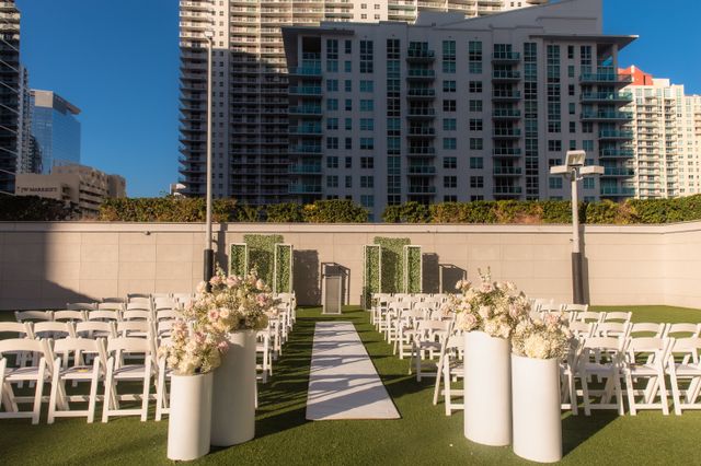 Featured photo from A Modern Brickell Wedding at Hotel AKA Featuring Sculptural Florals and Candlelight