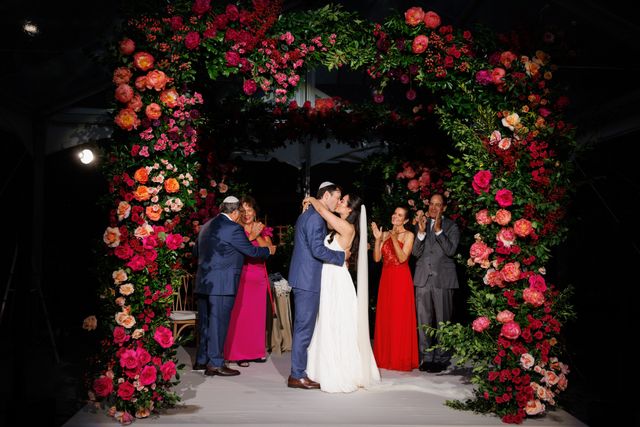 Featured photo from This Tented Central Park Zoo Wedding Was Meant To Be with Vibrant Garden Florals and Candlelit Tablescapes