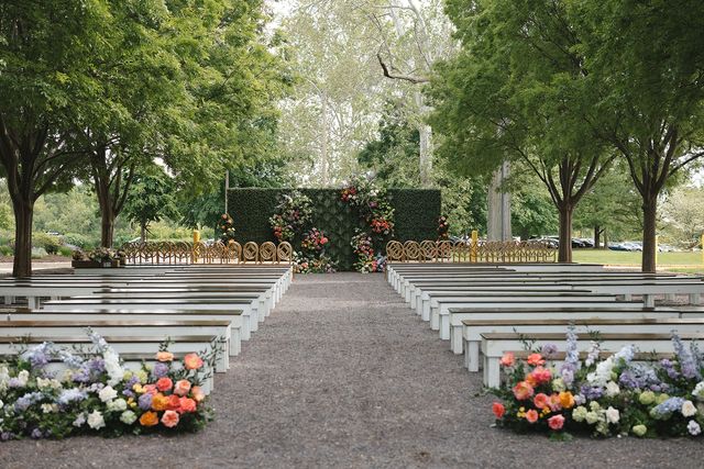 Featured photo from A Scenic Wedding Featuring Garden Aisle Florals and Open-Air Reception Design at the World’s Fair Pavilion