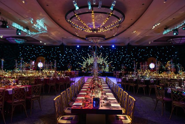Featured photo from Step Into This Color-Drenched Gala at Kravis Center with Jewel-Toned Table Design and Dramatic Lighting