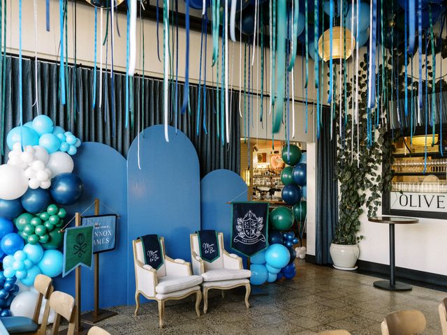 Featured photo from Step Into This Blue Baby Shower in St. Louis with Custom Pennants and Layered Balloon Garlands