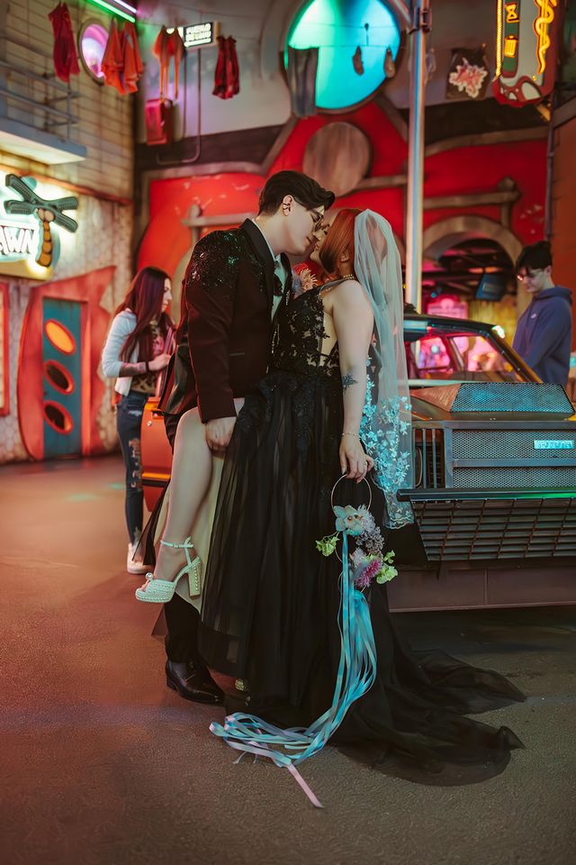 Featured photo from Meow Wolf Wedding