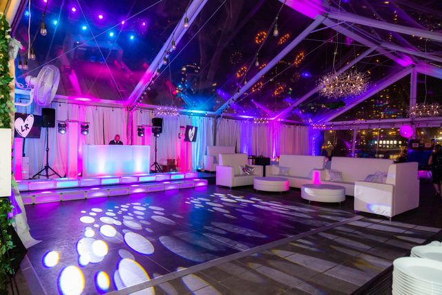 Featured photo from Discover This Stylish Bat Mitzvah at The Sanctuary Illuminated by Vibrant Lighting and Custom Details