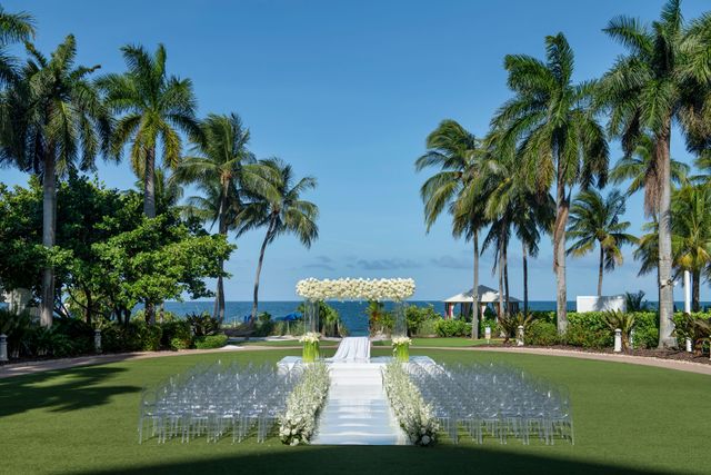 Featured photo from Take In This Miami Wedding Accented with Cascading White Florals and Warm Ballroom Design