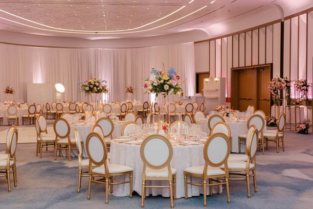 Featured photo from Celebrate This Florida Wedding at a Modern Coastal Venue with Blush Lighting and Floral-Framed Spaces