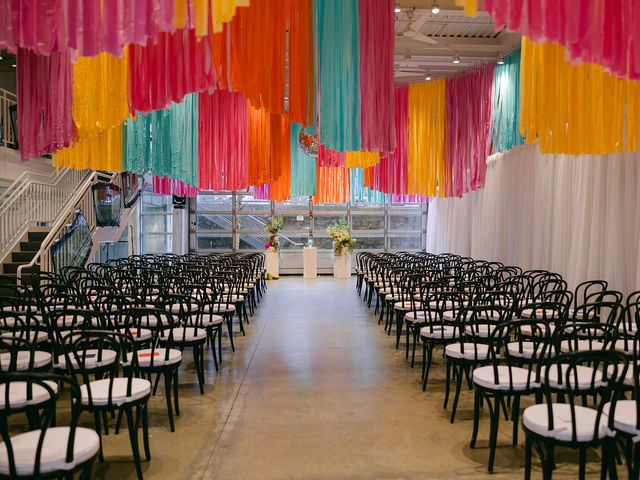 Featured photo from Inside this Retro-Inspired Wedding with Bold Décor at the Artists for Humanity Epicenter