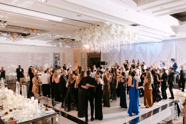 Featured photo from Celebrate This Formal Boston Wedding with Floor-to-Ceiling Draping and Crystal Lighting