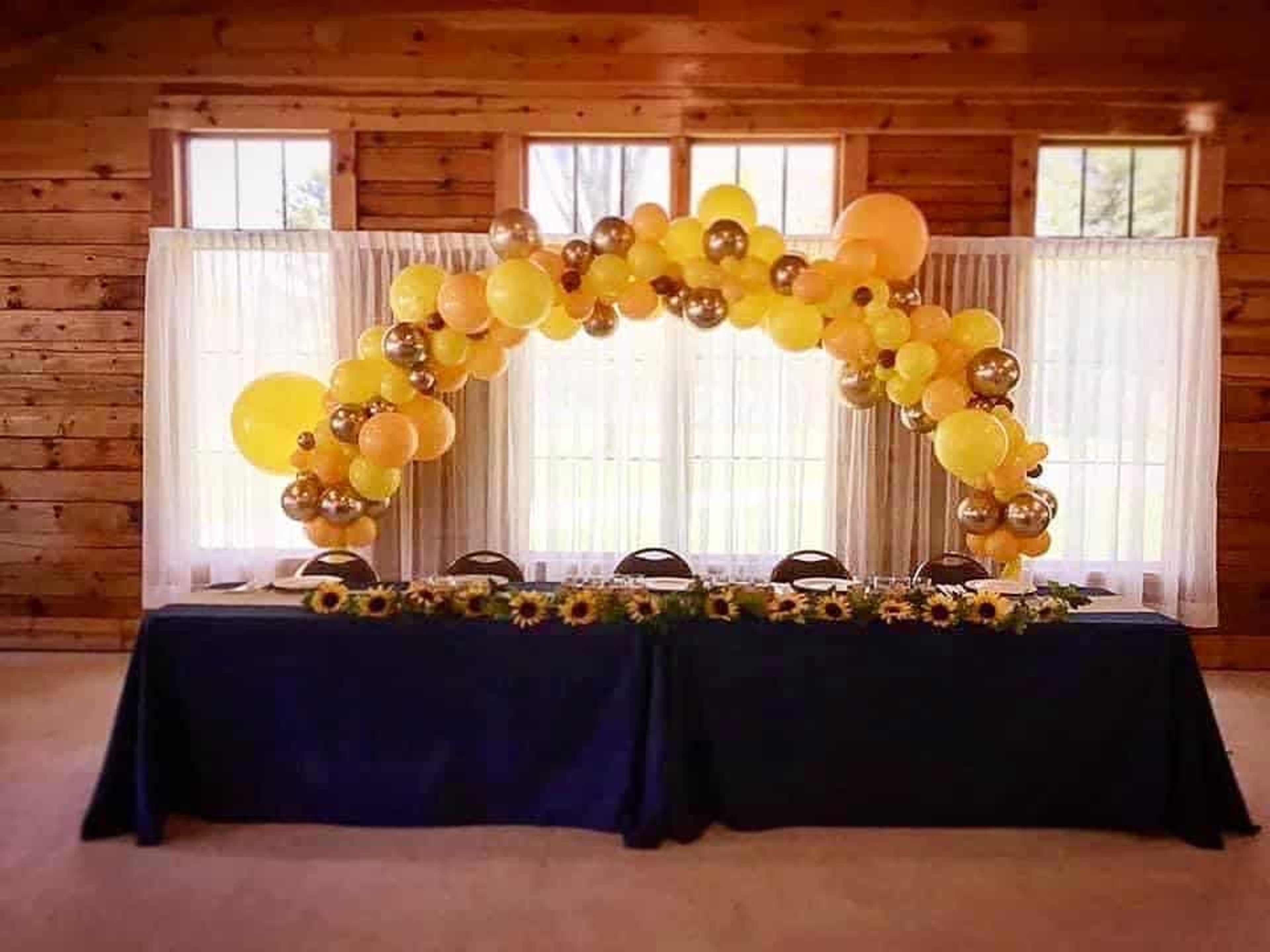 Log Cabin Banquet Hall, an event space at American Wilderness Campground & Event Center