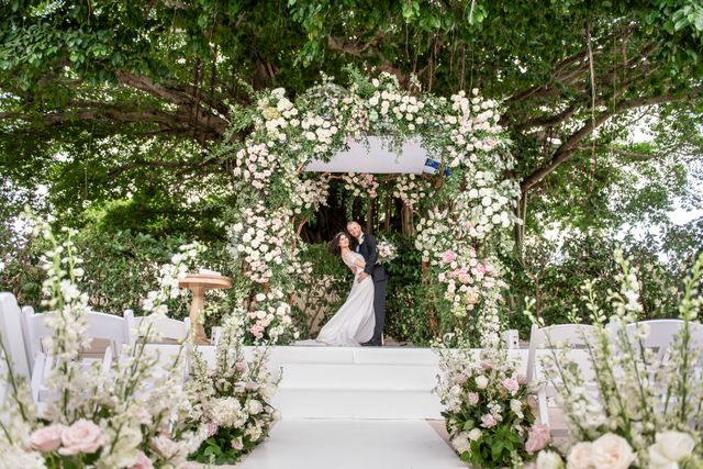 Featured photo from See This Classic Celebration in Coral Gables Shaped by Timeless White Blooms and Elegant Gold Highlights