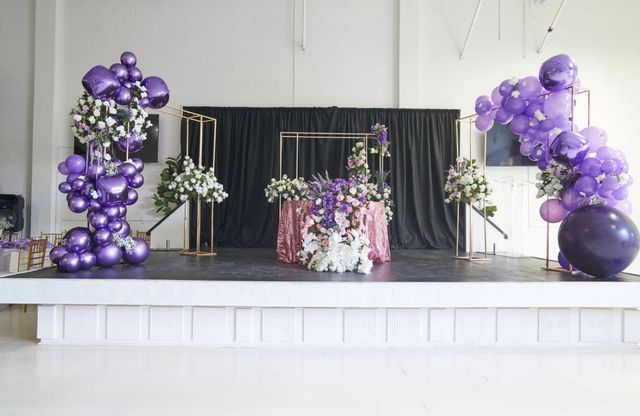Featured photo from Celebrate This Floral-Filled Birthday with Cascading Purple Blooms and Gold Accents at Venue 2409