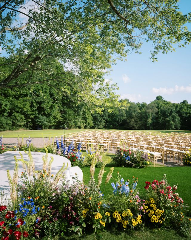Featured photo from Colorful Garden Wedding With Lush Florals & Dramatic Draping