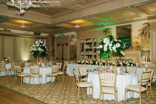 Featured photo from Celebrate This Refined Wedding with Classic White Florals and Tropical Greenery at Lost Tree Beach Club