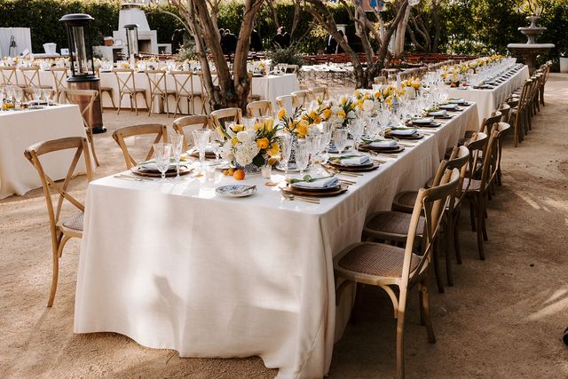 Featured photo from Celebrate This Orange County Wedding with Hanging Disco Balls, Potted Orange Trees, and Al Fresco Reception Design