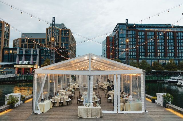 Featured photo from Experience This Waterfront Washington DC Wedding with a Clear-Top Tent and Layered Floral Design