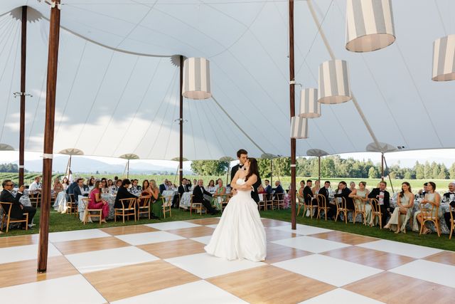 Featured photo from See this Tented Wedding with Blue Accents and Natural Details in Bow, WA
